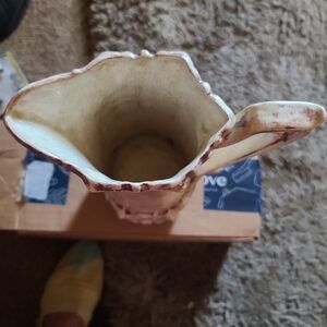 A glass pitcher handcrafted.